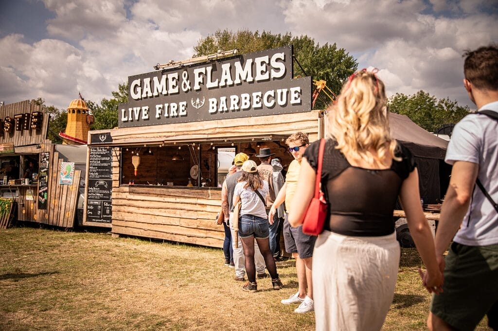 Game & Flames BBQ trader with queue at music festival